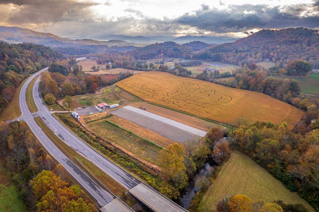 Aerial view of a highway and fields near Franklin, NC